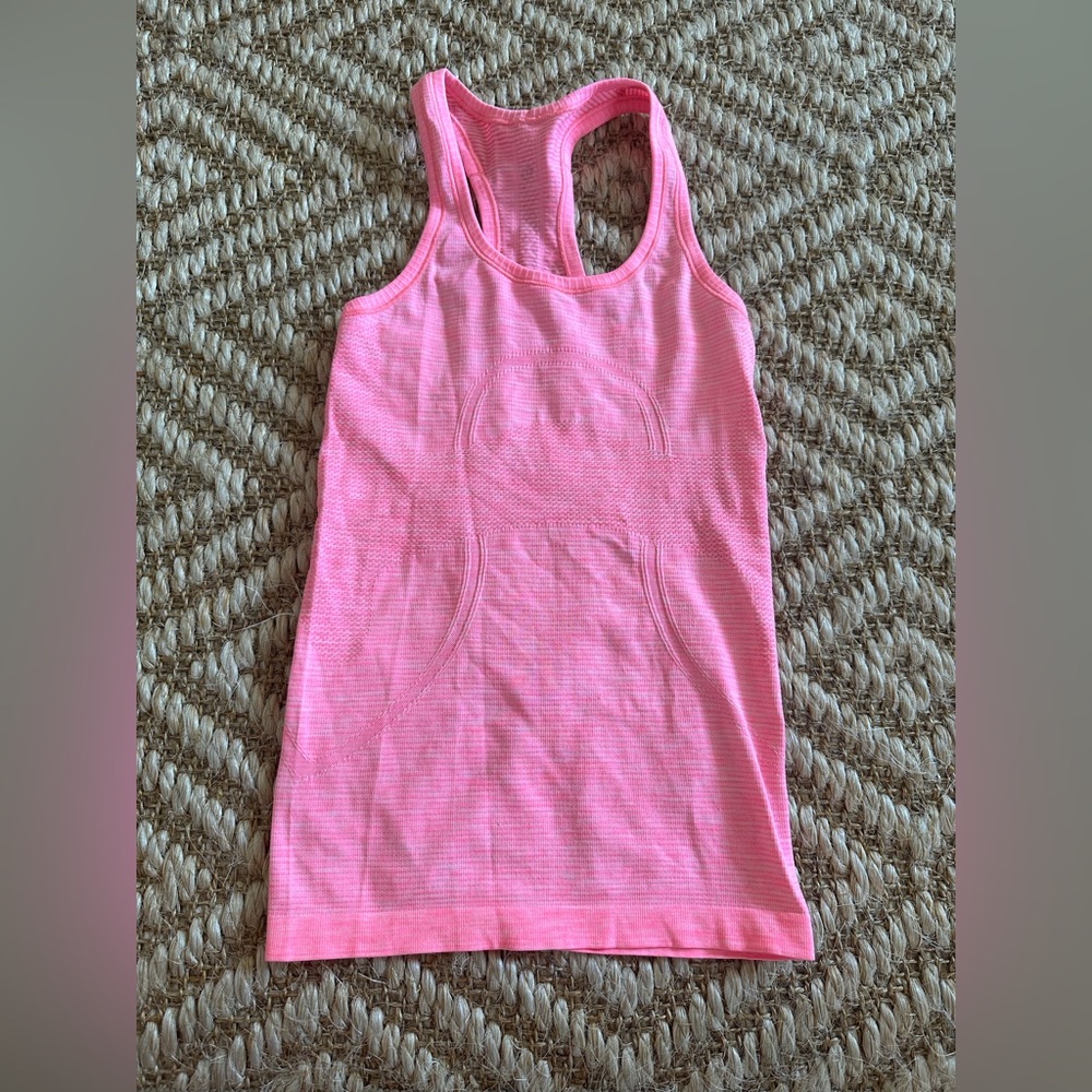 Pink lululemon swiftly tech racerback tank top.